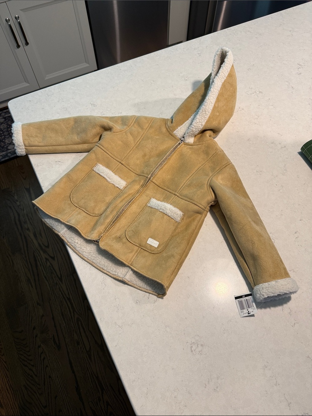 7 For all Mankind so suede tan with white Sherpa lining. Size 4T. New with tags.
